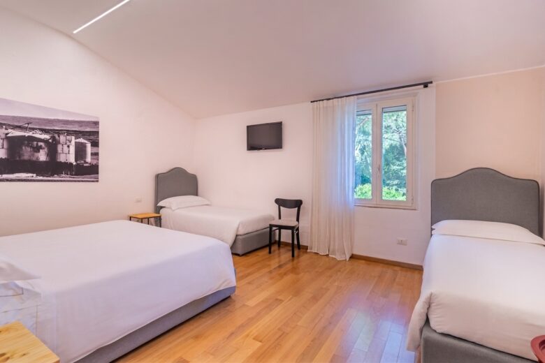 Camera dell'agriturismo ai Prati Perugia con 4 posti letto, ideale per famiglie o gruppi di amici