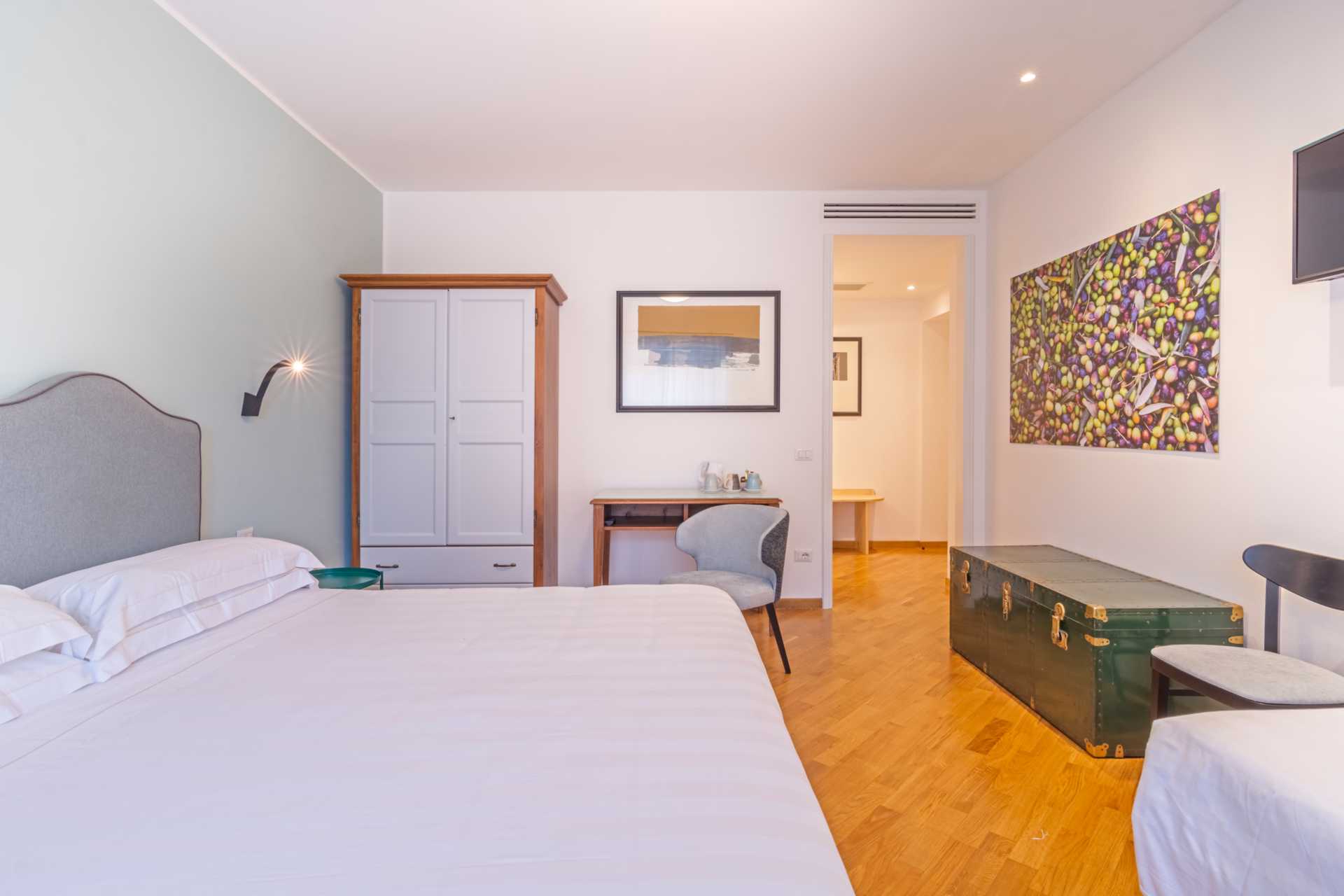 Camera tripla Standard con un letto matrimoniale e un letto singolo all'Agriturismo Ai Prati a Perugia